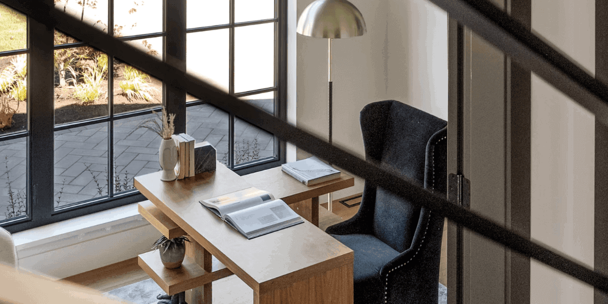 A custom home office with large windows