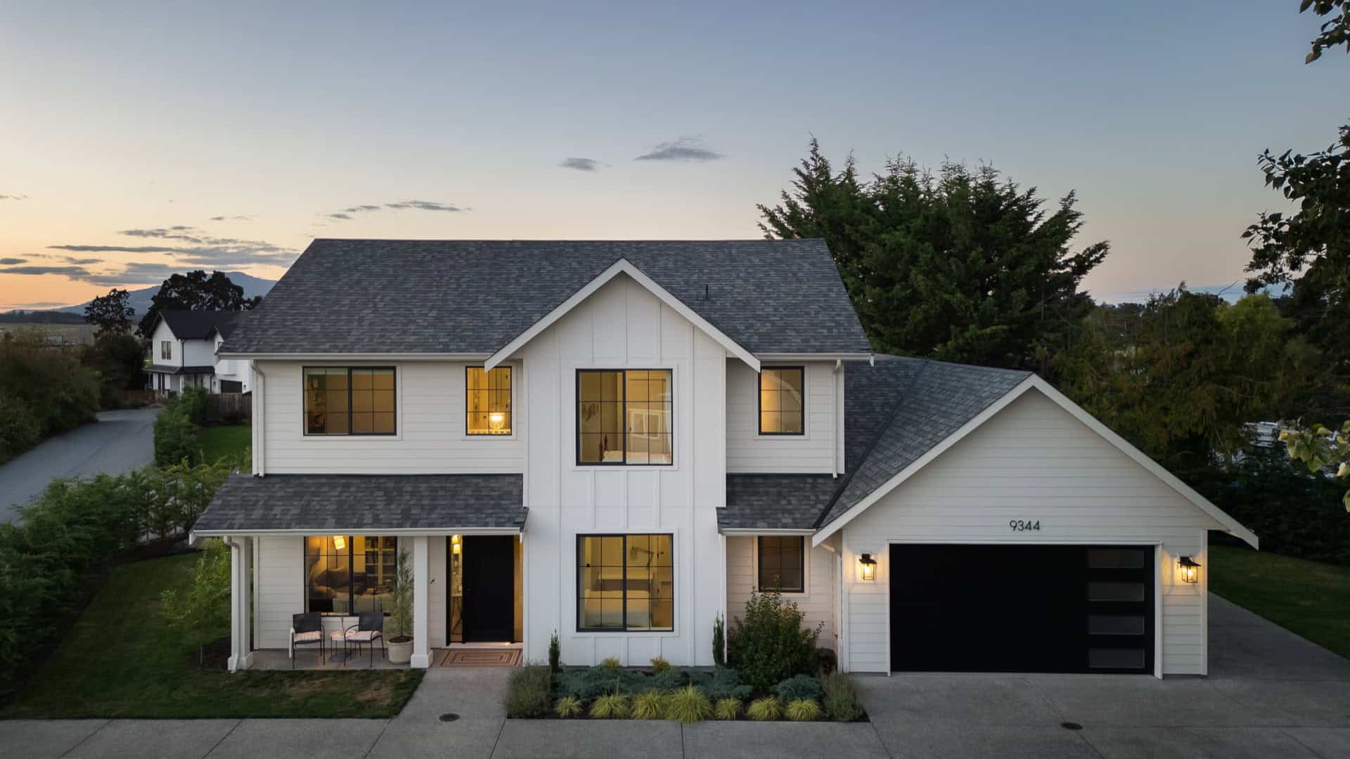 Victoria BC custom home exterior at Copperwood by White Wolf Homes, modern two-story with gray roof.